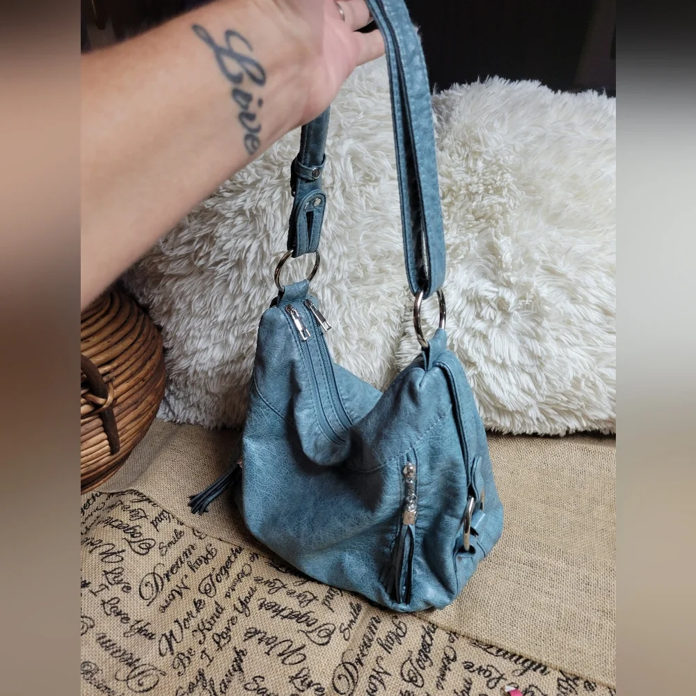 Greyish blue faux leather shoulder bag with silver tone hardware